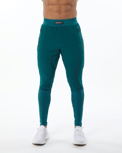 Alphalete Woven 4-Way Stretch 29" Pant Velvet Teal | 963-VRJNMI